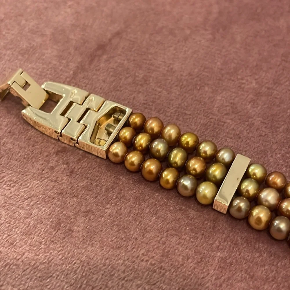 Gold Tone Three Strand Bracelet with Cultured Pearls and Rhinestones